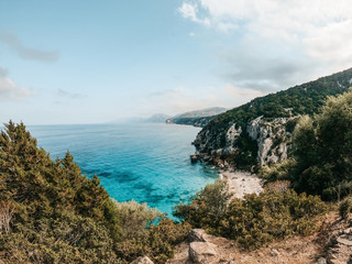 Fototapeta na wymiar Coastal landscape with crystal clear water and stunning beaches in Sardinia, Italy