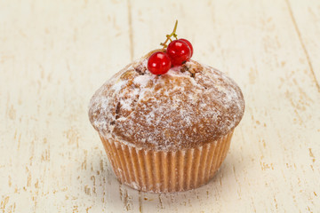 Sweet tasty muffin with red currants