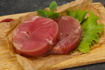 Raw tuna round steak for grill