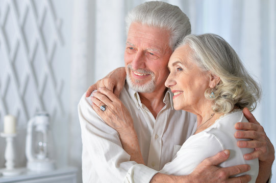 portrait of a happy senior couple hugging