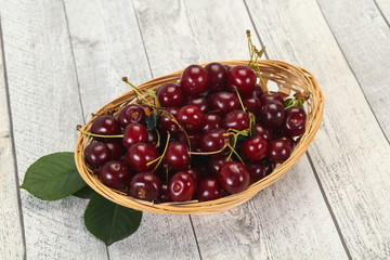 Sweet ripe cherry with leaves