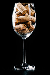 Wine corks with "Chile" text in a wine glass. Chilean wine concept.