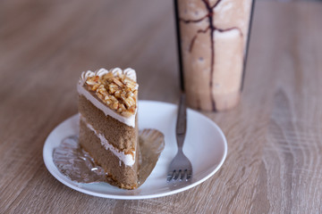 Almond Coffee Cake with vanilla latte on wood table 