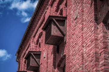 Red wall of old castle