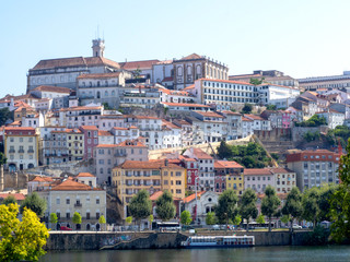 Coimbra, Portugal - August 03, 2019: Skyline of Coimbra city viewed from accross the Mondego river