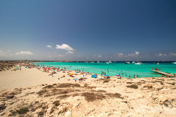 beach with umbrellas and sunbeds-formentera