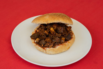 Goan pork sorpotel server in a burger