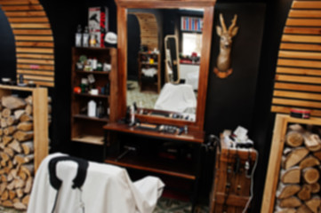 Blured photo of interior and chairs at barbershop. Barber soul.