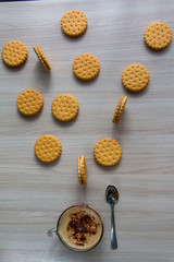 Cappuccino and cookies on a wooden table
