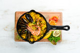 Seafood rice. Paella with mussels and shrimp. Top view. Free space for your text.