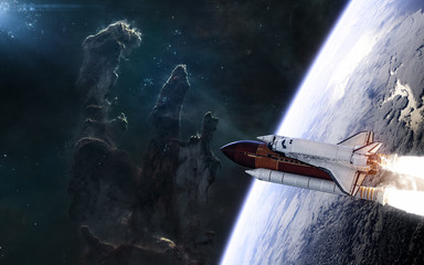 Obraz premium Space shuttle flying away from planet against background of the Pillars of Creation. The beauty of deep space. Science fiction. Elements of this image furnished by NASA