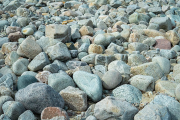 Stones in different sizes, forms and colors. Summertime in Sweden.