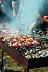 Making barbecue kebab shashlik on wooden coal grill meat food fresh health beacon pork eat