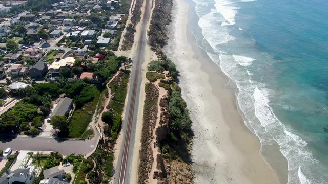 Aerial view of Del Mar coastline and beach, San Diego County, California, USA. Pacific ocean with long beach and small waves