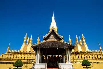 Fototapeta premium Pha That Luang Temple, The Golden Pagoda in VIENTIANE ,LAOS PDR. The most famous landmark of LAOS. Layout for magazine, ads.