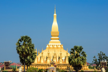Fototapeta premium Pha That Luang Temple, The Golden Pagoda in VIENTIANE ,LAOS PDR. The most famous landmark of LAOS. Layout for magazine, ads.