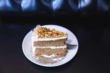 almond coffee cake on dark background