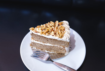 almond coffee cake on dark background