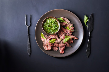 plate with sliced roast beef