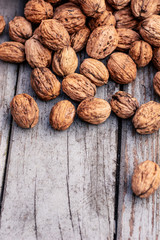 Walnuts close-up on a wooden background.