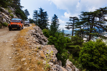 Excursion trip in the all-wheel drive vehicles on mountain roads, Kemer, Antalya, Turkey © petrrgoskov