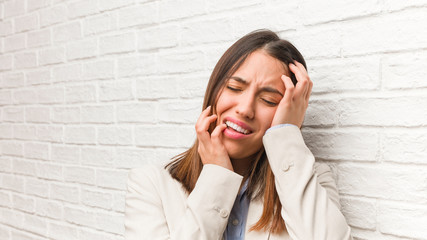 Young business woman desperate and sad
