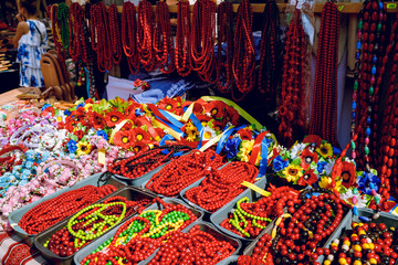 Fototapeta premium Red beads made of wood. Brightly.