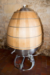 Fototapeta na wymiar modern Amphora Winemaking steel and wood ancient technique of amphorae to make wine