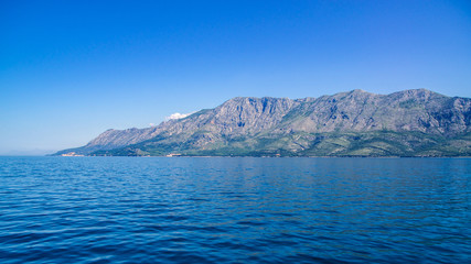 Fototapeta na wymiar View of a mountain range on Croatia's coast.