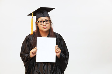 Photo of a young female graduate holding white copy space