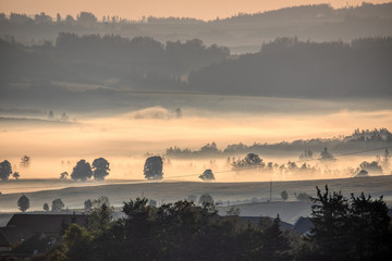 traditional fall landscape, Central europe. Foggy and misty sunrise landscape, Czech Republic