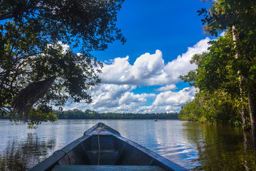 Sailing in Canoa, Sandoval Lake. Peruvian jungle, Peruvian Amazon.
