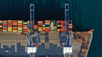 Aerial top down photo of containers in ship port for business Logistics and transportation of Container Cargo, logistic import export and transport © aerial-drone