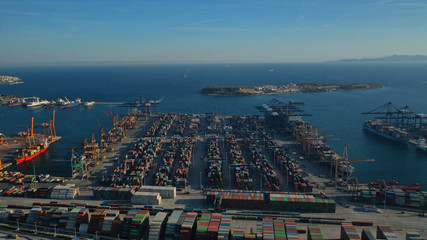 Aerial photo of industrial cargo container terminal in Perama and Drapetsona commercial port near Piraeus, Attica, Greece
