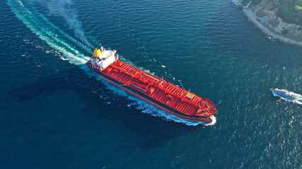 Aerial top down photo of industrial oil and fuel tanker cruising open ocean sea © aerial-drone