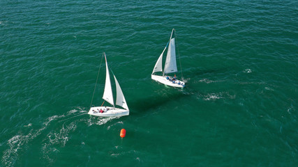Aerial photo of sail boats practising for regatta near port of Mikrolimano, Piraeus, Attica, Greece
