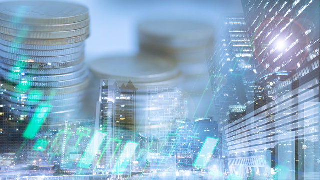 Financial investment concept, Double exposure of city night and stack of coins for finance investor, Forex trading candlestick chart, Cryptocurrency  Digital economy. economy growing.