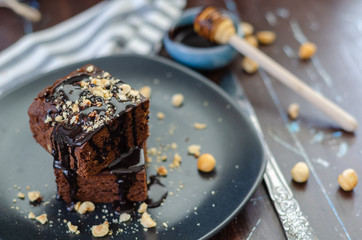 Chocolate Brownie cake on a dark plate