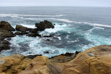 waves crashing on rocks