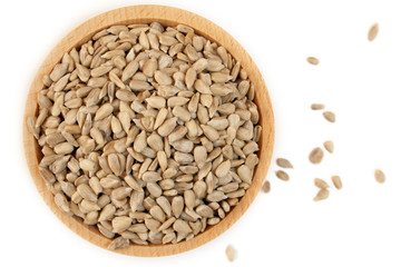 Sunflower seeds in a bowl on a white background