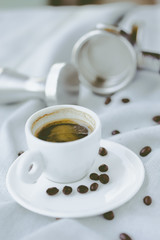 Hot espresso coffee in a white coffee cup