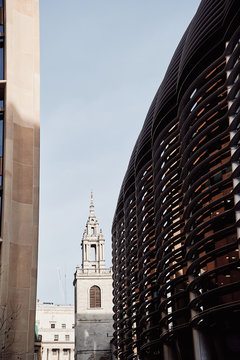 Modern and old buildings on city street