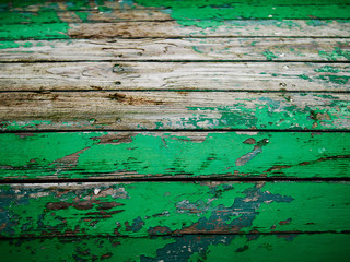 Old green boat wooden abstract texture. Selective focus.