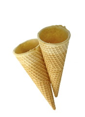 Empty waffle Cup for ice cream isolated on white background. Waffle cone on white background. Empty sugar waffle cones. 