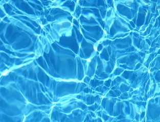 Surface of blue swimming pool,background of water in swimming pool. Water background blue.