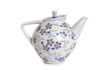 Antique porcelain tableware for tea on a white background