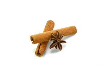 Cinnamon sticks and anise star isolated on white background close up. Spice Cinnamon sticks and anise star.