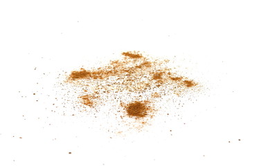 Spice cinnamon powder isolated on a white background. Cinnamon powder spilled on a white surface.