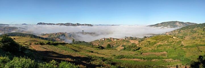 High resolution panorama - typical Madagascar landscape at Alakamisy Ambohimaha region fog rolls...