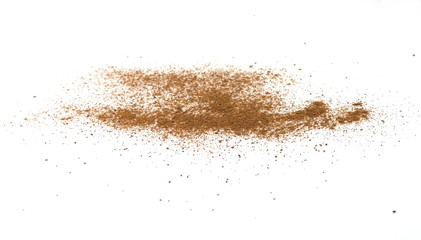 Fototapeta na wymiar Spice cinnamon powder isolated on a white background. Cinnamon powder spilled on a white surface.